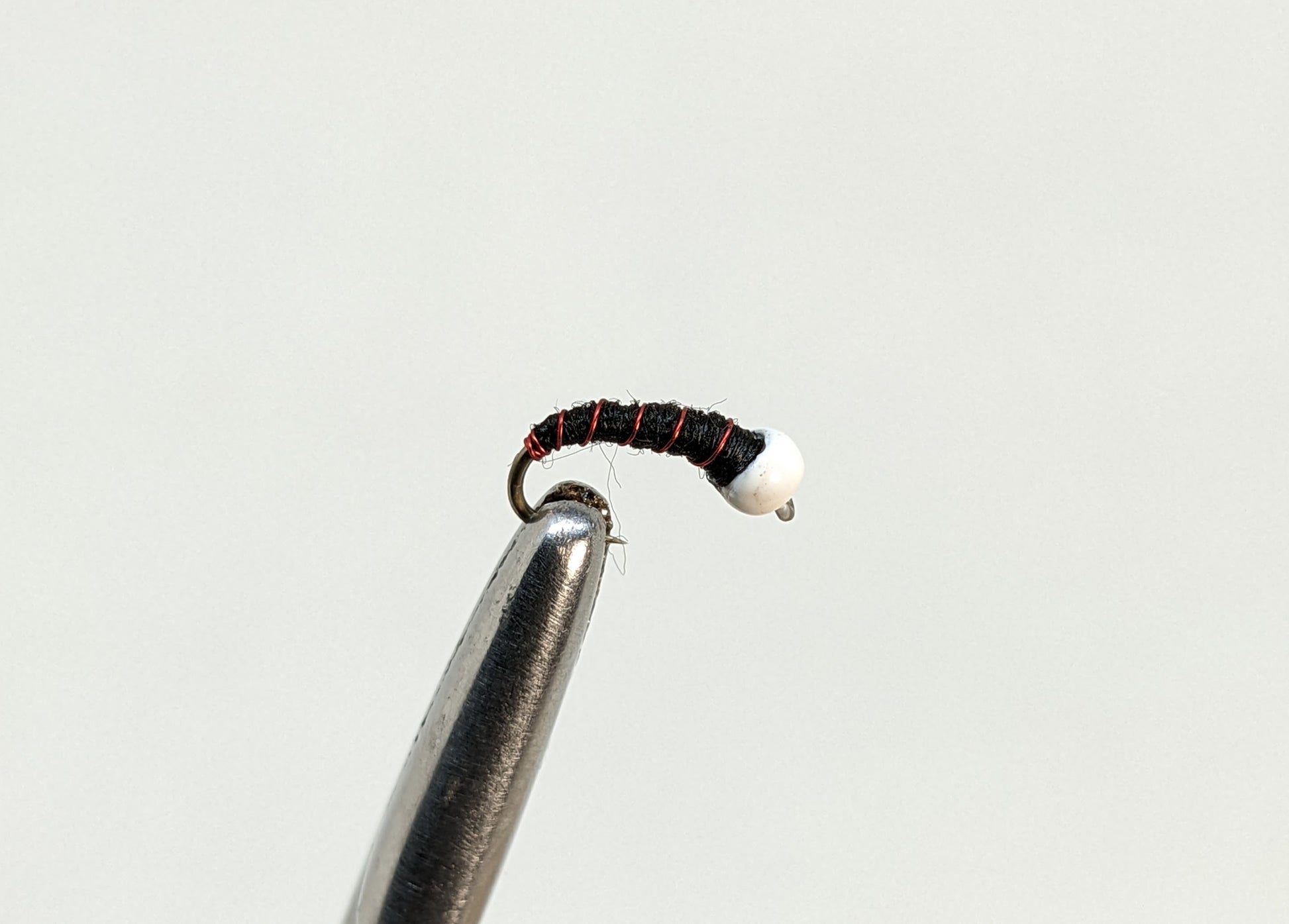 Chironomid Bead Head Black Fly fishing fly. Dry, subsurface and nymph flies for anglers and fisherman. All the flies you need for sale online. Flies to buy online. Online fly fishing supplies. Catch fish with flies from Frontier Flies.