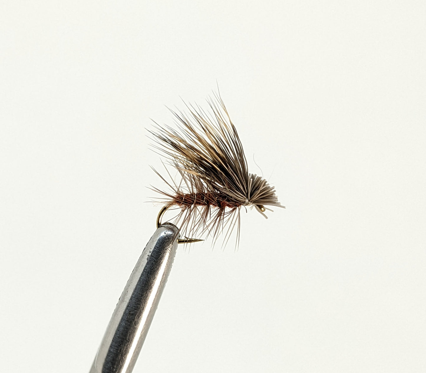 Elk Hair Caddis Brown  Fly fishing fly. Dry, subsurface and nymph flies for anglers and fisherman. All the flies you need for sale online. Flies to buy online. Online fly fishing supplies. Catch fish with flies from Frontier Flies.