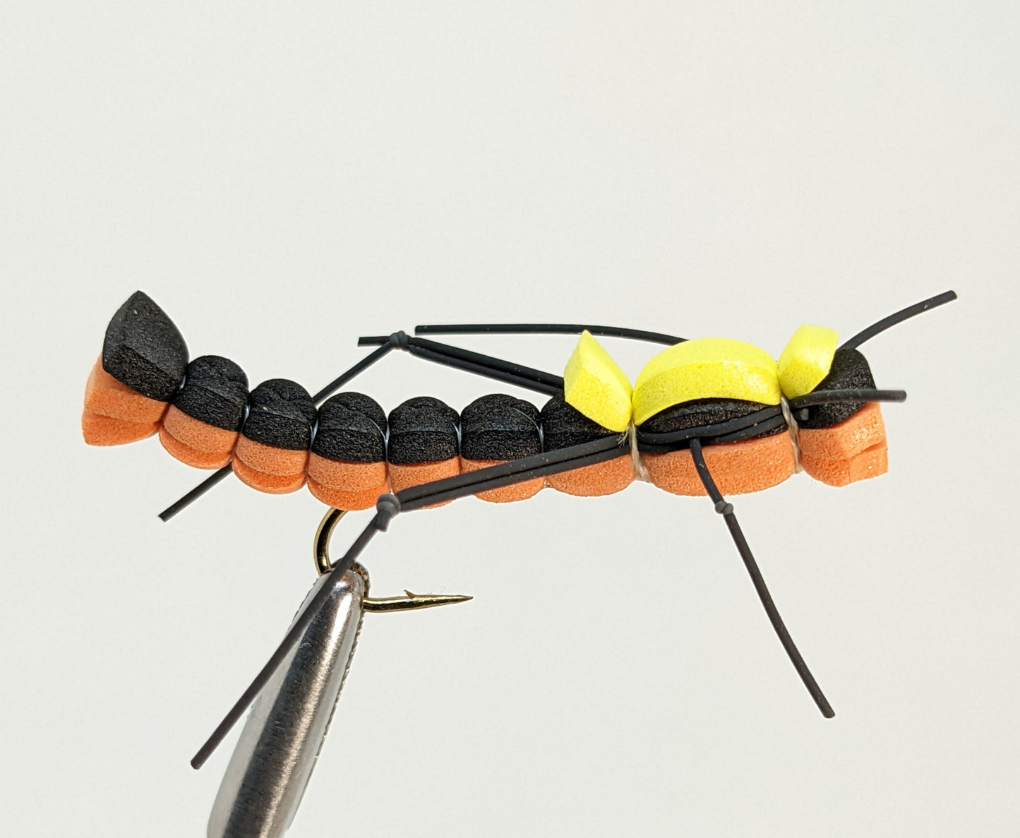 Foam Hopper Orange  Fly fishing fly. Dry, subsurface and nymph flies for anglers and fisherman. All the flies you need for sale online. Flies to buy online. Online fly fishing supplies. Catch fish with flies from Frontier Flies.