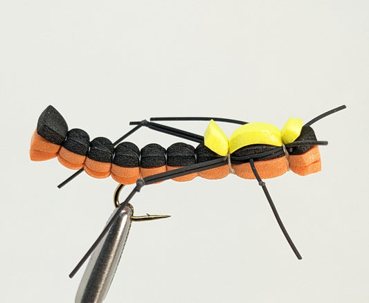 Foam Hopper Orange  Fly fishing fly. Dry, subsurface and nymph flies for anglers and fisherman. All the flies you need for sale online. Flies to buy online. Online fly fishing supplies. Catch fish with flies from Frontier Flies.