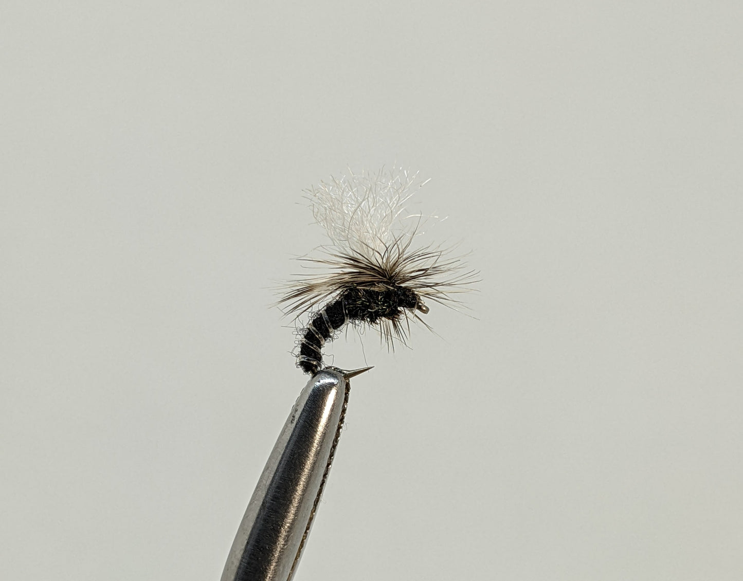 Klinkhammer Emerger Black  Fly fishing fly. Dry, subsurface and nymph flies for anglers and fisherman. All the flies you need for sale online. Flies to buy online. Online fly fishing supplies. Catch fish with flies from Frontier Flies.