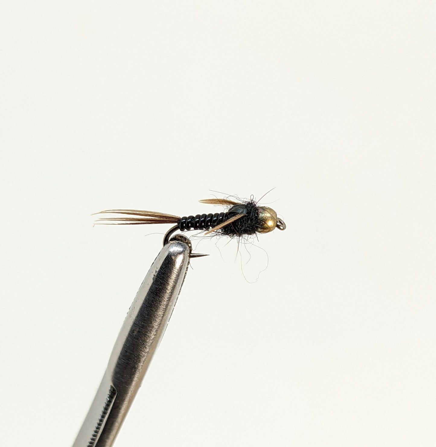 Nymphomaniac Bead Head Black  Fly fishing fly. Dry, subsurface and nymph flies for anglers and fisherman. All the flies you need for sale online. Flies to buy online. Online fly fishing supplies. Catch fish with flies from Frontier Flies.