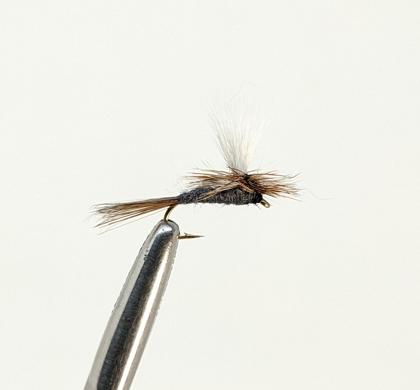 Adams Parachute Fly fishing fly. Dry, subsurface and nymph flies for anglers and fisherman. All the flies you need for sale online. Flies to buy online. Online fly fishing supplies. Catch fish with flies from Frontier Flies.