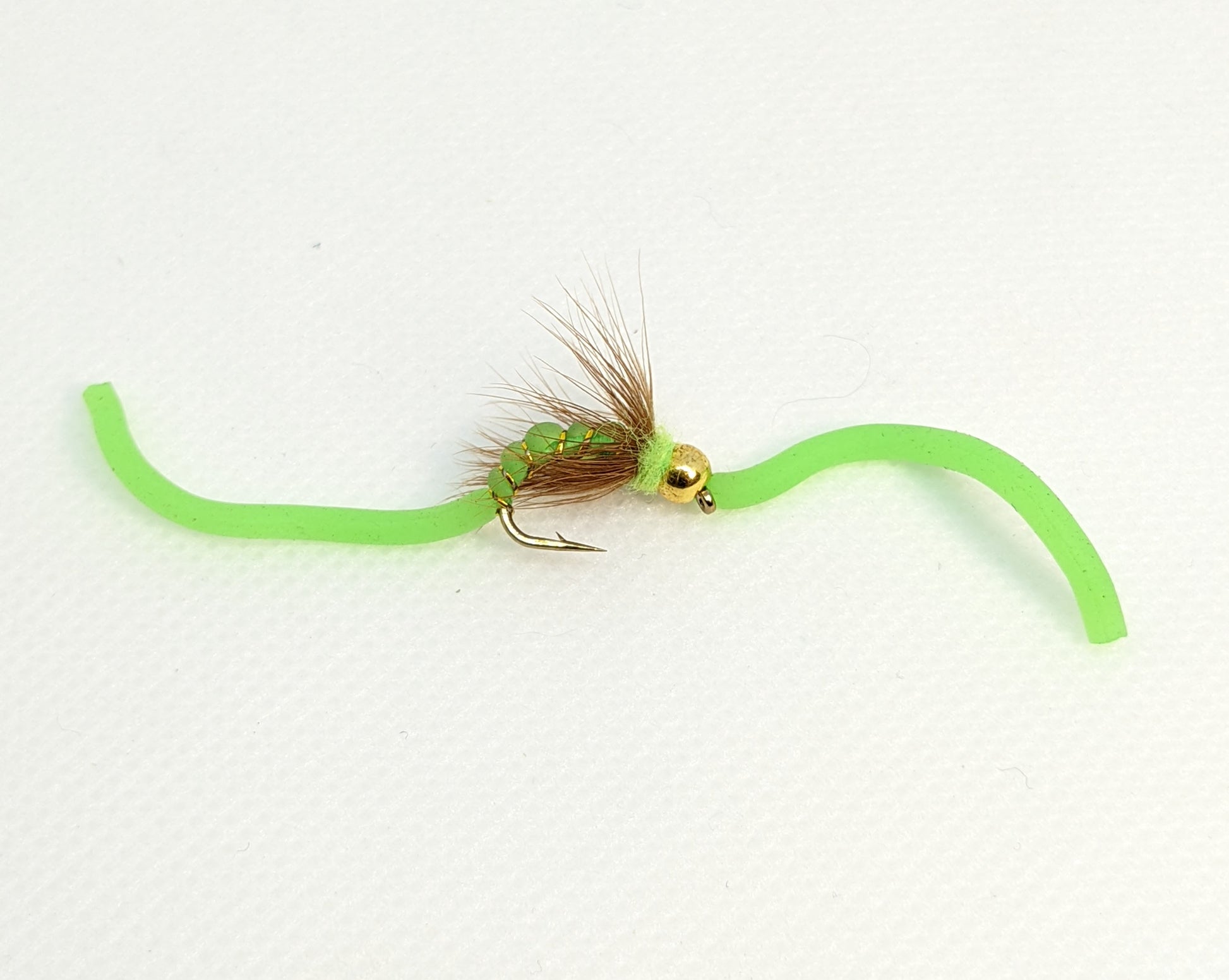 Squirmy Worm Bead Head Chartreuse Fly fishing fly. Dry, subsurface and nymph flies for anglers and fisherman. All the flies you need for sale online. Flies to buy online. Online fly fishing supplies. Catch fish with flies from Frontier Flies.