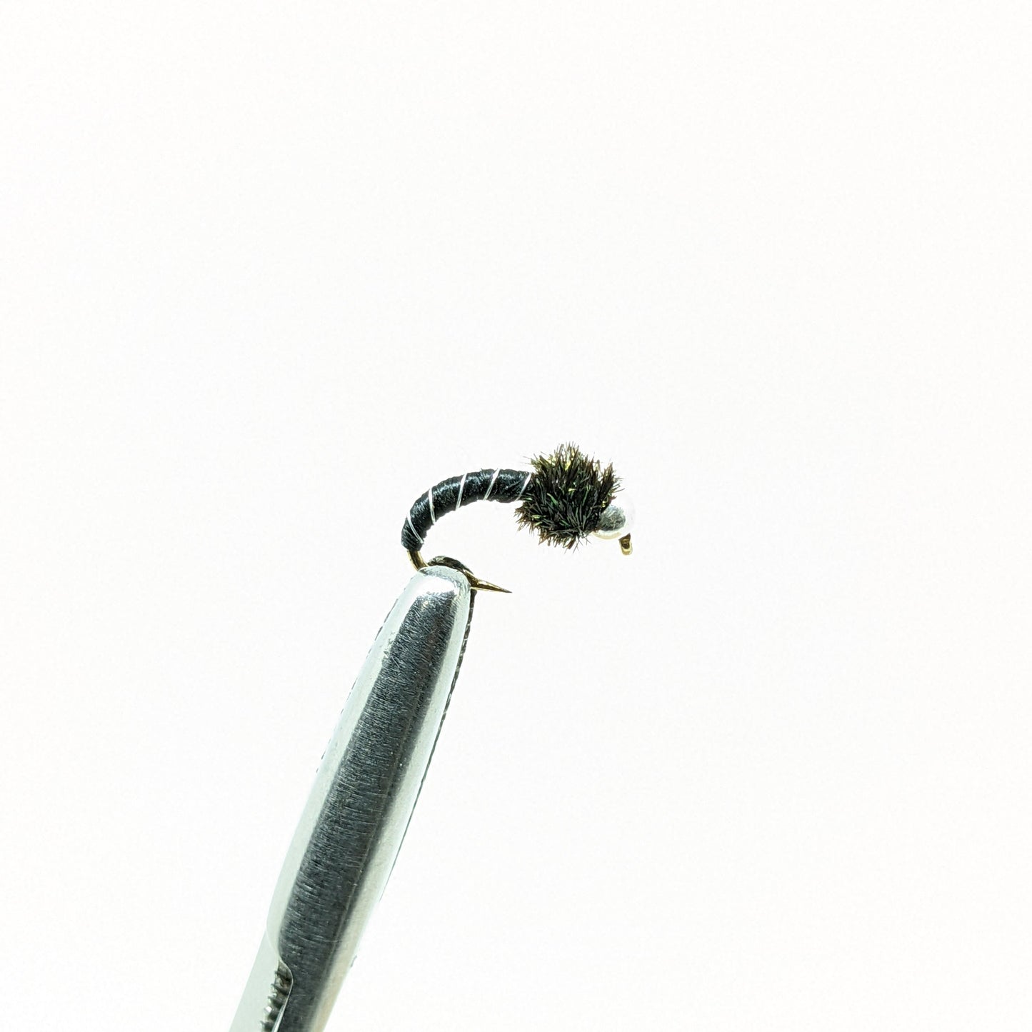 Zebra Midge Black Fly fishing fly. Dry, subsurface and nymph flies for anglers and fisherman. All the flies you need for sale online. Flies to buy online. Online fly fishing supplies. Catch fish with flies from Frontier Flies.