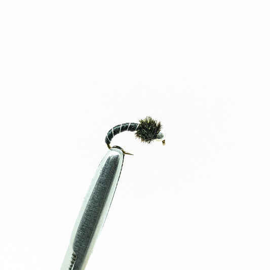 Zebra Midge Black Fly fishing fly. Dry, subsurface and nymph flies for anglers and fisherman. All the flies you need for sale online. Flies to buy online. Online fly fishing supplies. Catch fish with flies from Frontier Flies.